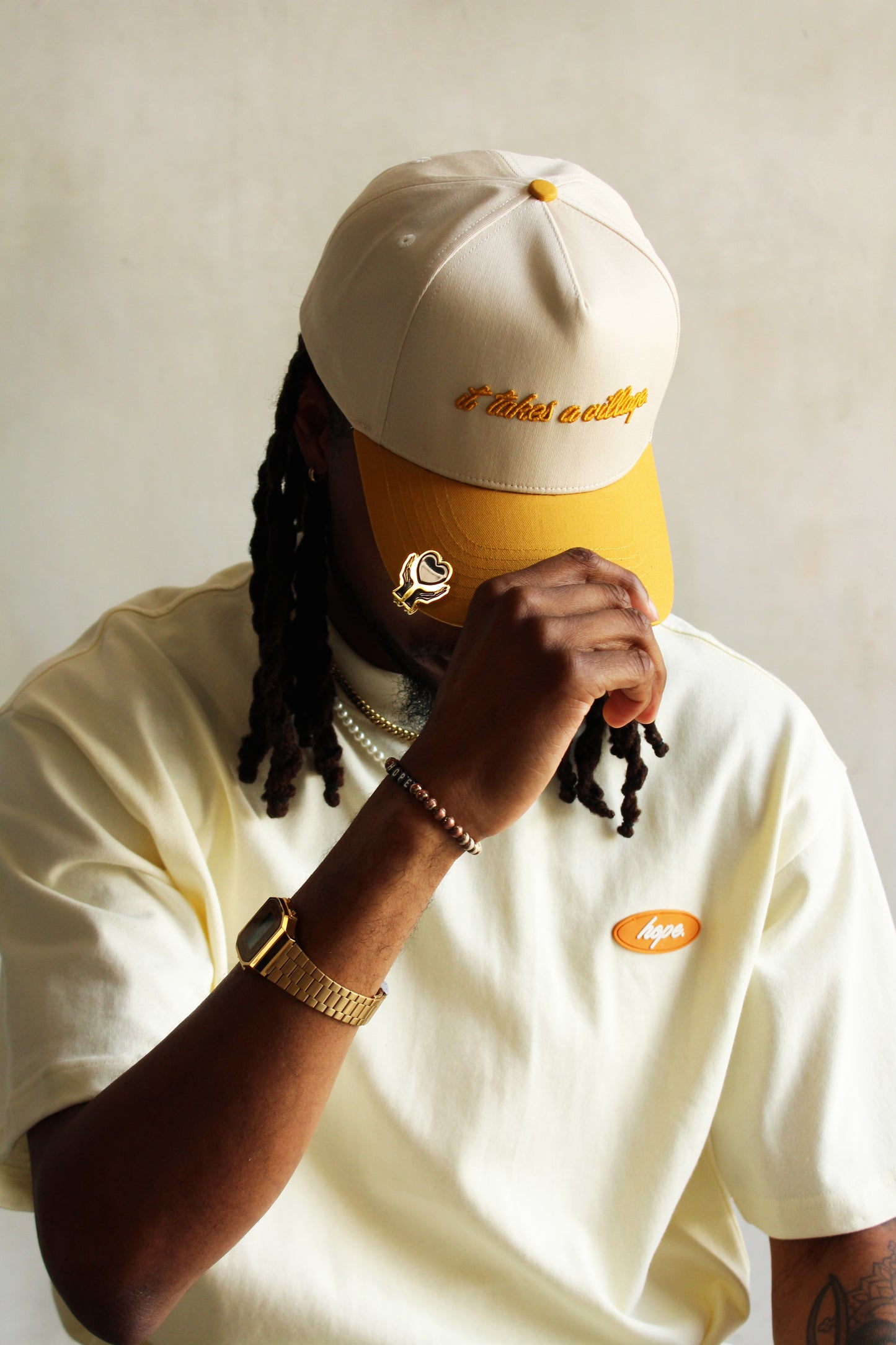 It Takes A Village Cap